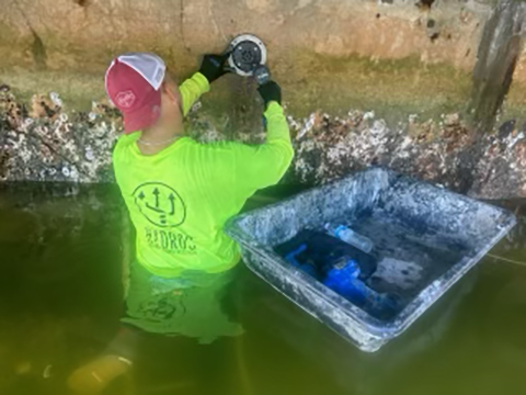 Hydros Team Member Junior Installing JETFilter Weep Hole Drains – Hallandale Beach, FL